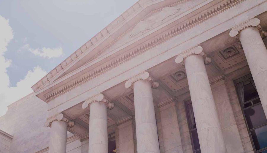 White concrete building under blue sky