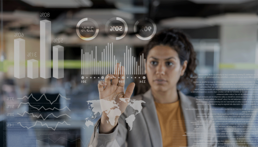 Woman looking at data on interactive screen